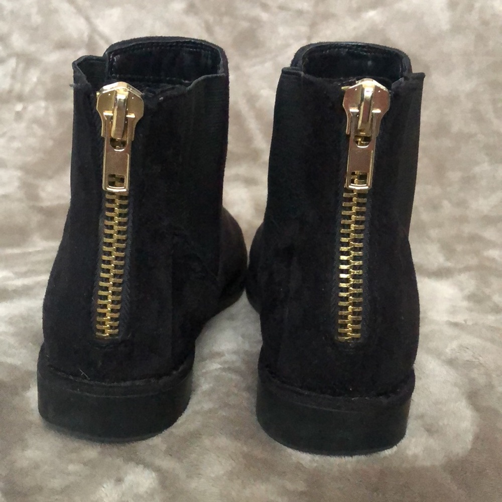 Black suede ankle booties that zip in the back